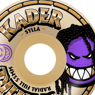 A single skateboard wheel shown on a plain white background. The wheel has a tan and beige base with black and gold graphics, including the text 'KADER', 'SYLLA', 'SPITAFIT', and 'RADIAL FULL SMM'.