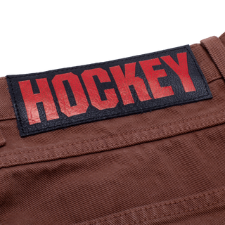 2022_Hockey_QTR3_GraphicDetail_Apparel_DoubleKneeJean_Brown_Detail7_1400x